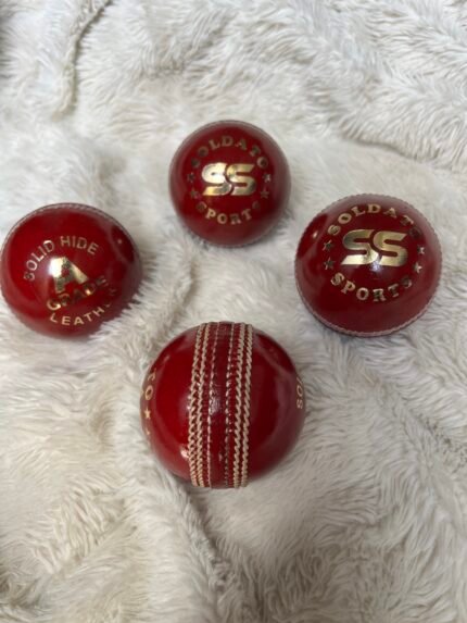 An alum tanned leather cricket ball from Soldato Sports, expertly handcrafted with a traditional 60-stitch seam and high-retention cork core for a perfect swing across 50+ overs. Completely customizable with custom branding, logo printing, and personalized leather options to suit your team's needs.